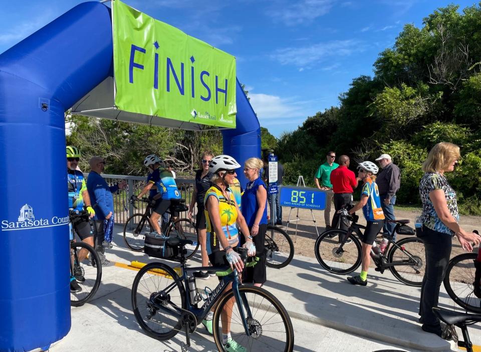 Cyclists await the ribbon cutting for the Legacy Trail North Port Connector in September 2022. The Gulf Coast Community Foundation has been a steadfast advocate for the Legacy Trail, providing more than $300,000 in financial support.