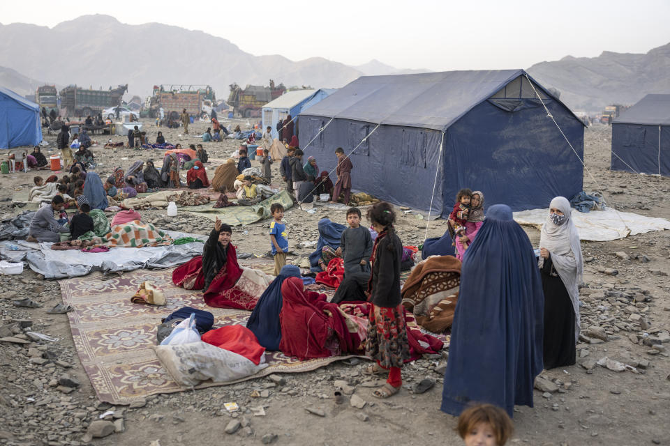 Afghan refugees settle in a camp near the Torkham Pakistan-Afghanistan border in Torkham, Afghanistan, Saturday, Nov. 4, 2023. A huge number of Afghans refugees entered the Torkham border to return home hours before the expiration of a Pakistani government deadline for those who are in the country illegally to leave or face deportation. (AP Photo/Ebrahim Noroozi)