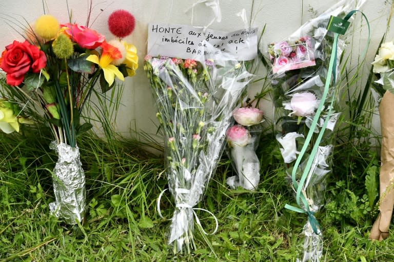Flowers were left at the crime site in Pau, with a note reading: "Shame on the imbecile youngsters responsible for this barbaric act"