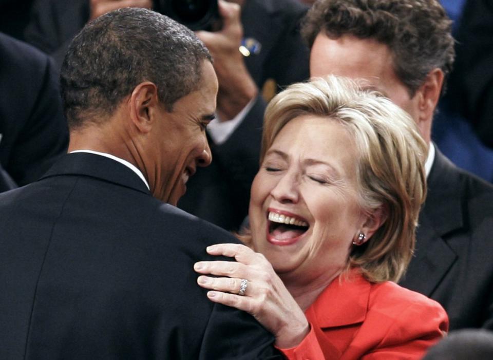 President Barack Obama and Secretary of State Hillary Clinton embrace