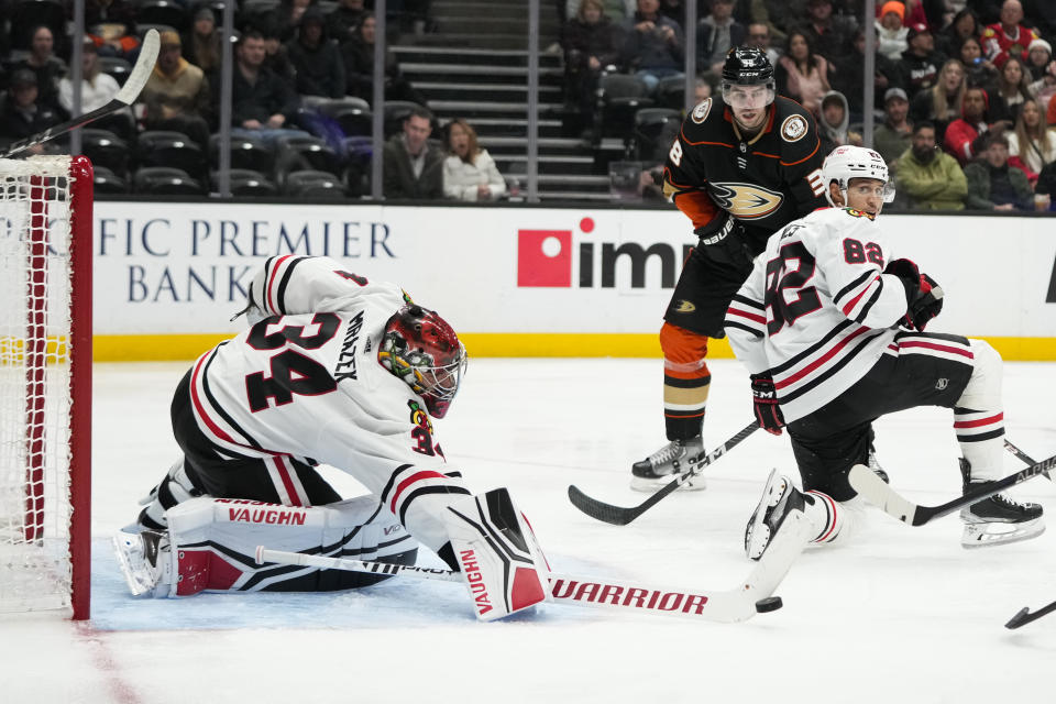 Chicago Blackhawks goaltender Petr Mrazek (34) stops a shot during the third period of an NHL hockey game against the Anaheim Ducks Monday, Feb. 27, 2023, in Anaheim, Calif. The Ducks won 4-2. (AP Photo/Jae C. Hong)