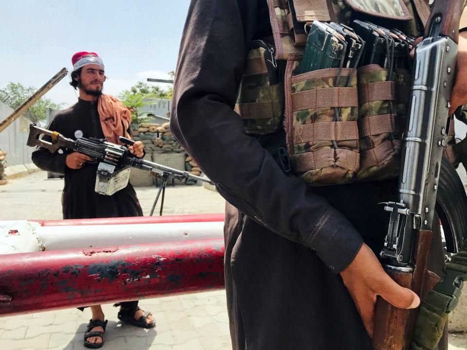 Taliban soldiers with guns.