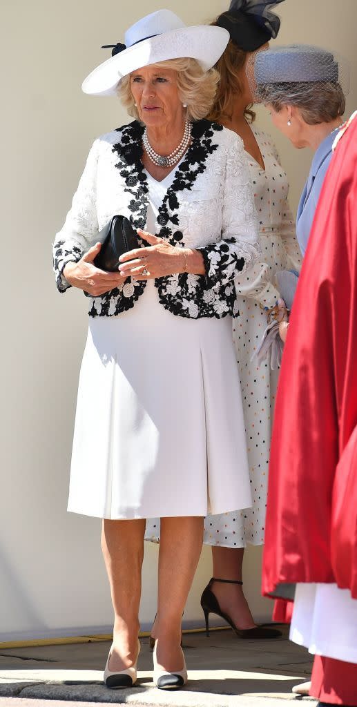 <p>The Duchess of Cornwall stepped out in a white dress and white jacket embroidered with black floral detail while attending the <a href="https://www.townandcountrymag.com/society/tradition/g21599124/queen-elizabeth-prince-william-order-of-the-garter-2018-photos/" rel="nofollow noopener" target="_blank" data-ylk="slk:Order Of The Garter Service;elm:context_link;itc:0;sec:content-canvas" class="link ">Order Of The Garter Service</a> at Windsor Castle.</p>