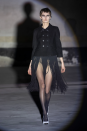 <p>For No. 21’s fall 2021 collection, designer Alessandro Dell’Acqua presented looks that each highlighted a sensual part of the body: A cropped Bar jacket with a fringe skirt accented the legs, an ocelot-printed brassiere and matching pencil skirt showcased the midriff, and fitted strapless lace dress accentuated the arms and shoulders. The lineup was a celebration of the subtle sex appeal; there was nothing flagrant about the display of flesh. His inspiration was, after all, Carlo Mollino, the famed photographer, architect, and product designer whose work often reflected the curves of the female form.—<em>Barry Samaha </em></p>