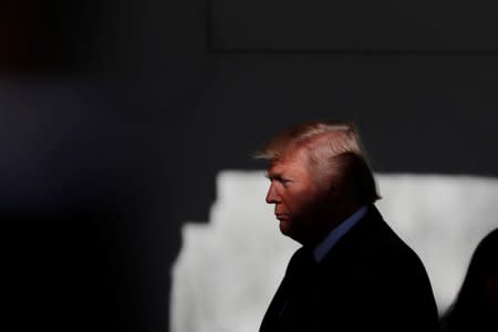 U.S. President Donald Trump prepares to address the annual March for Life rally, taking place on the National Mall, from the White House Rose Garden in Washington, U.S., January 19, 2018. REUTERS/Carlos Barria