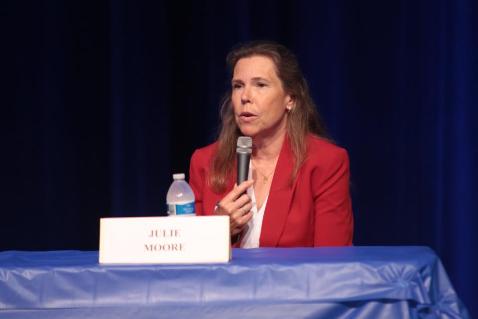 Julie Moore of Adrian Township, a Republican candidate for the 34th Michigan House District, answers a question during a candidate forum Thursday at Adrian High School.