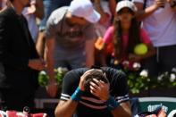 Just too much: Argentina's Juan Martin del Potro in tears after beating Marin Cilic in the quarter-finals