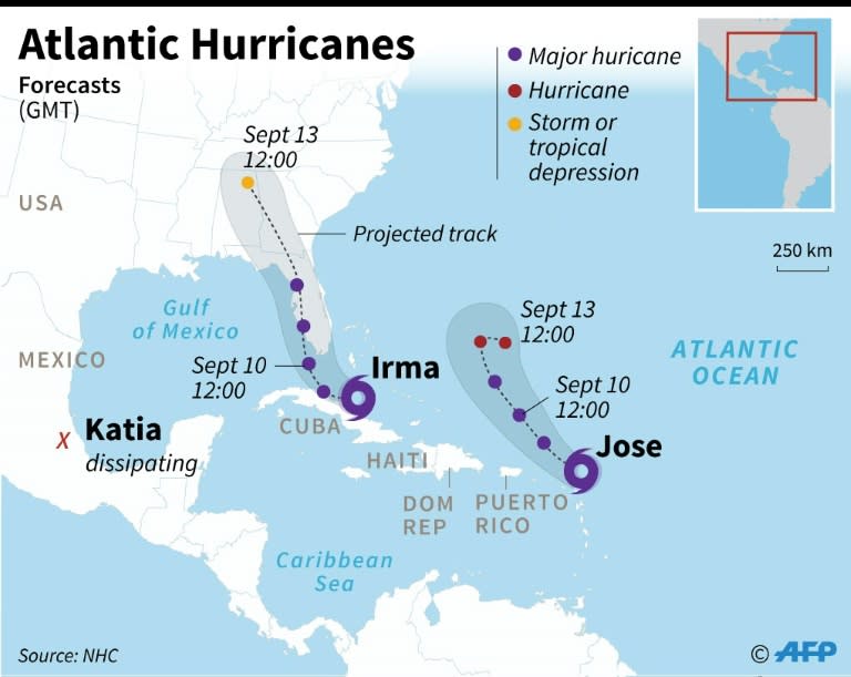 Updated map showing the forecast track of three hurricanes in the Atlantic