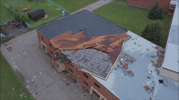 Staff are asked to stay out of Carleton North High School in Florenceville-Bristol until officials inspect the damage caused by high winds Wednesday. (Submitted by Brian Davis - image credit)