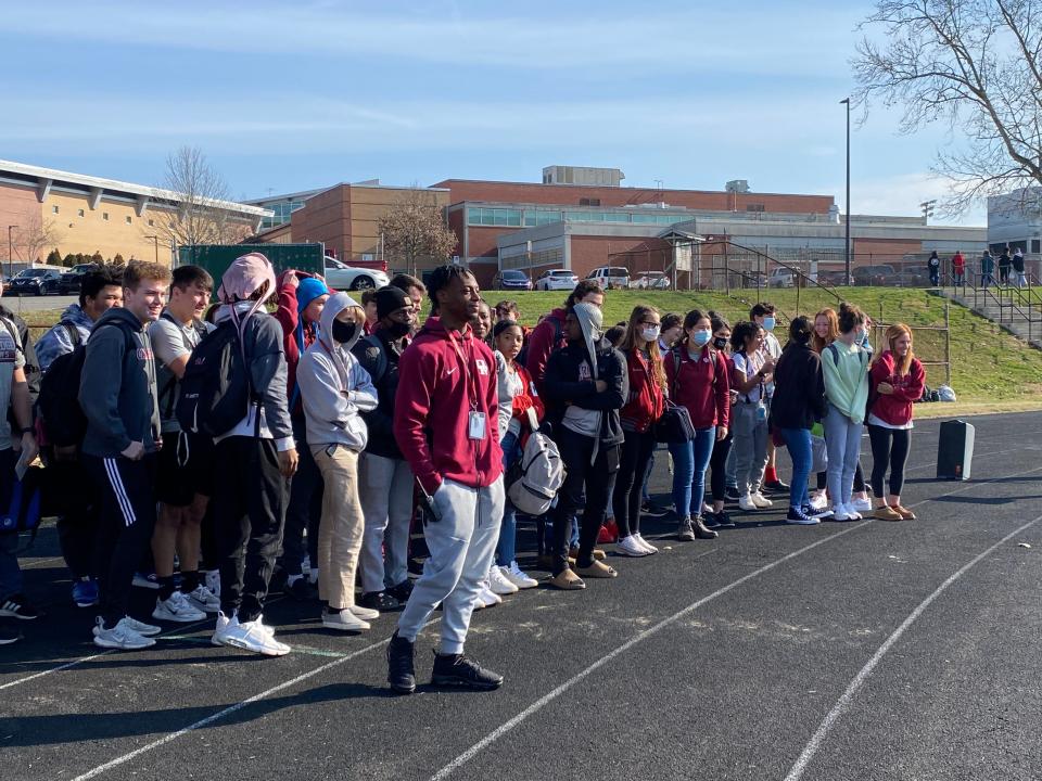 Students watch the groundbreaking for the Ben Martin Track project.