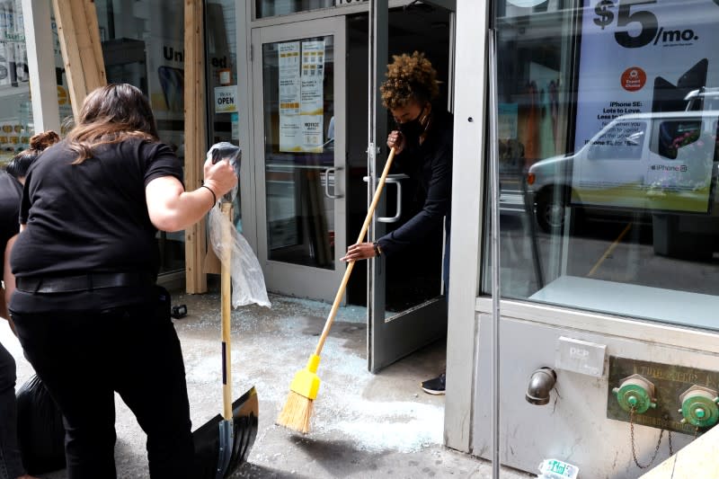 Damage and cleanup after protests against the death in Minneapolis police custody of George Floyd in New York