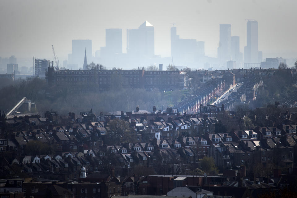 The Canary Wharf skyline viewed through the haze from Alexandra Palace, north London.