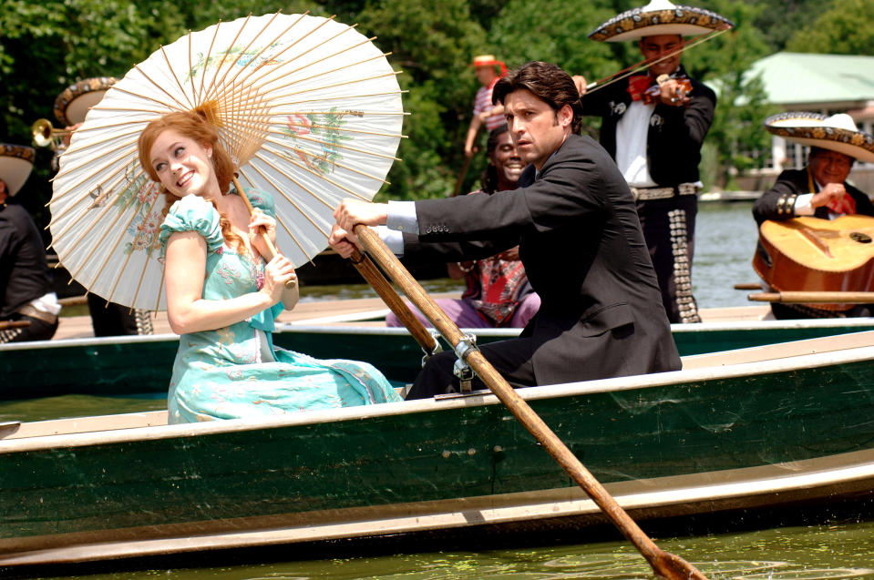 Amy Adams and Patrick Dempsey in a row boat in Enchanted.