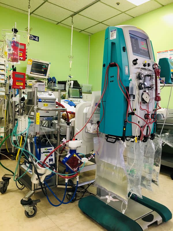 The ECMO machine is seen next to a coronavirus disease (COVID-19) patient at Hallym Sacred Heart Hospital ECMO Center in Anyang