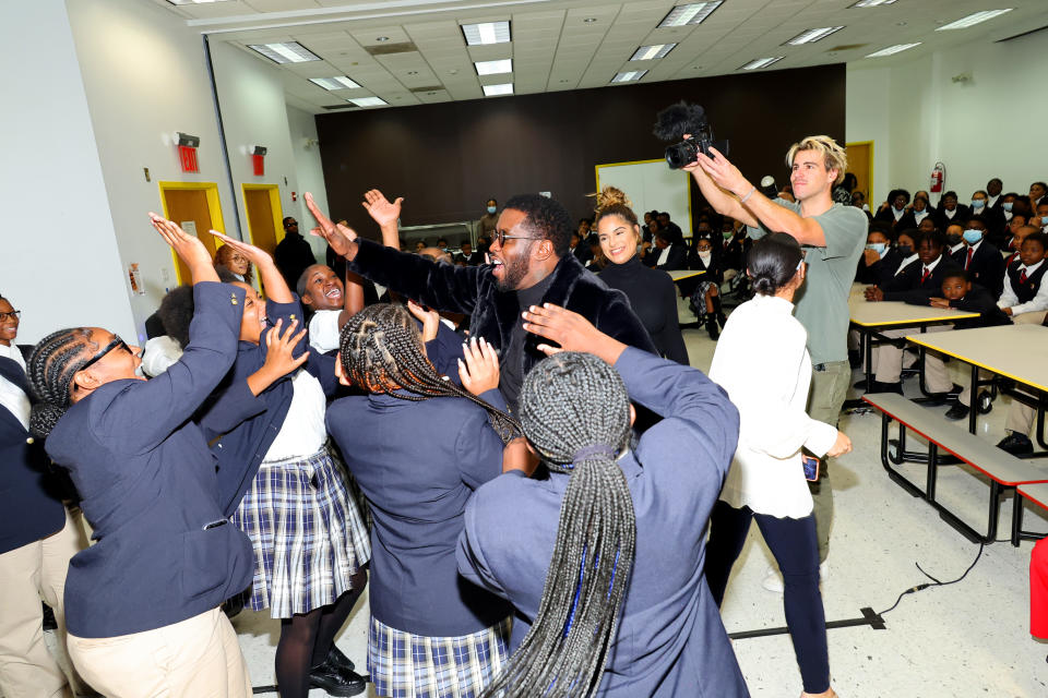 Diddy High-Fiving Bronx Students