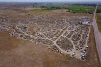 <p>We spent several pleasurable hours exploring L&L Classic Auto, but as you can see from this aerial photograph, we would have needed several days to have done the place justice. There is very little order to the stock, and you never know what gems you’re going to uncover down the next dirt track, or lurking behind the numerous rocky outcrops and shrubs that litter this incredible yard.</p>