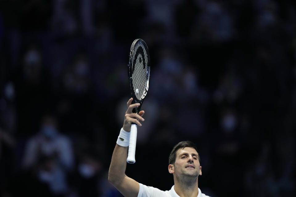 Serbia's Novak Djokovic celebrates after defeating Russia's Andrey Rublev during their ATP World Tour Finals singles tennis match, at the Pala Alpitour in Turin, Wednesday, Nov. 17, 2021. (AP Photo/Luca Bruno)