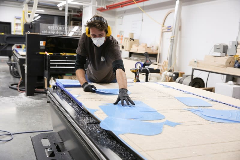 Workers at Bednark produce medical face shields, as the demand for their production rapidly increased