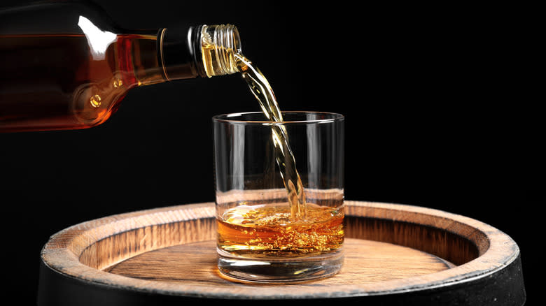 Whiskey being poured into glass