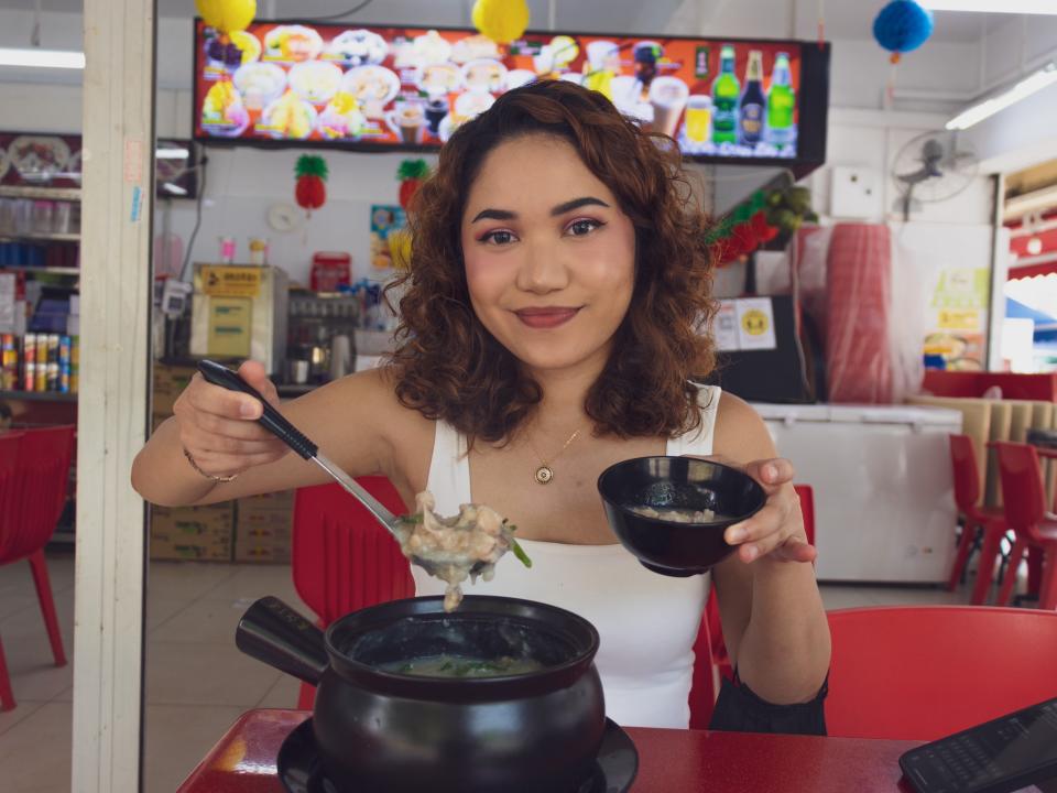 Me trying frog porridge for the first time.