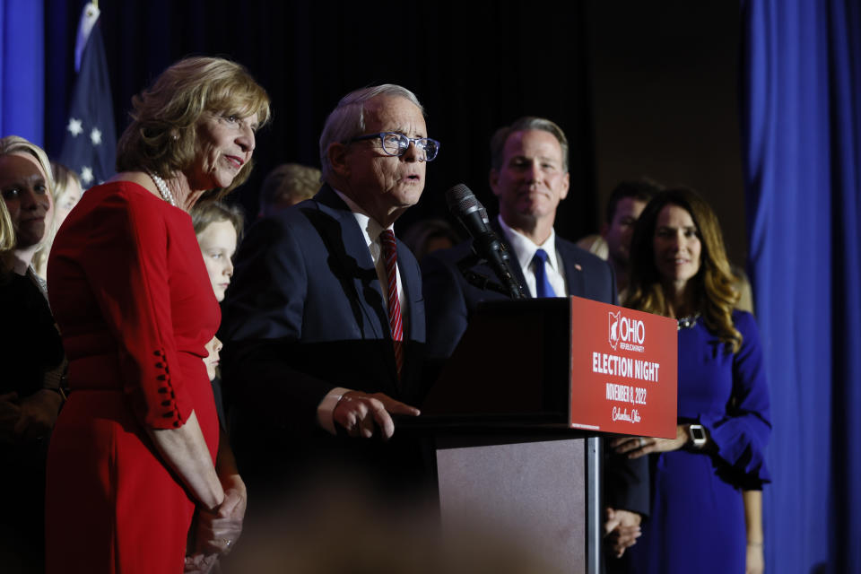 Republican Ohio Gov. Mike DeWine, second from left, speaks during an election night watch party Tuesday, Nov. 8, 2022, in Columbus, Ohio. (AP Photo/Jay LaPrete)