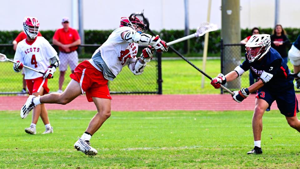 St. Andrews' Connor Hofbauer spares no fury while taking a shot in a regional semifinal win against Oxbridge on May 1, 2024.