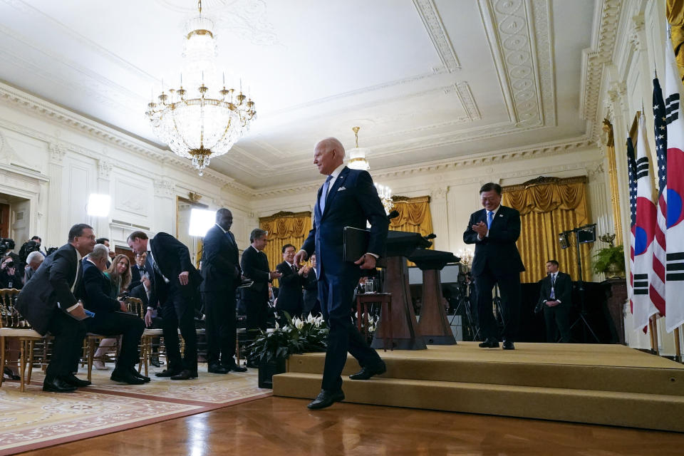 FILE - In this May 21, 2021, file photo President Joe Biden and South Korean President Moon Jae-in depart after a joint news conference in the East Room of the White House in Washington. Thanks to growing availability of the coronavirus vaccine and a recent relaxation of federal guidance on masks and distancing, the Biden administration is embracing the look and feel of pre-pandemic days on Pennsylvania Avenue. (AP Photo/Alex Brandon, File)