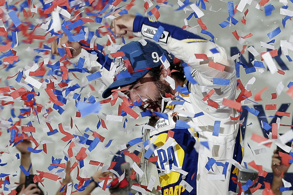 Chase Elliott celebrates in victory lane after winning the NASCAR Cup Series auto race at Charlotte Motor Speedway in Concord, N.C., Sunday, Sept. 29, 2019. (AP Photo/Gerry Broome)