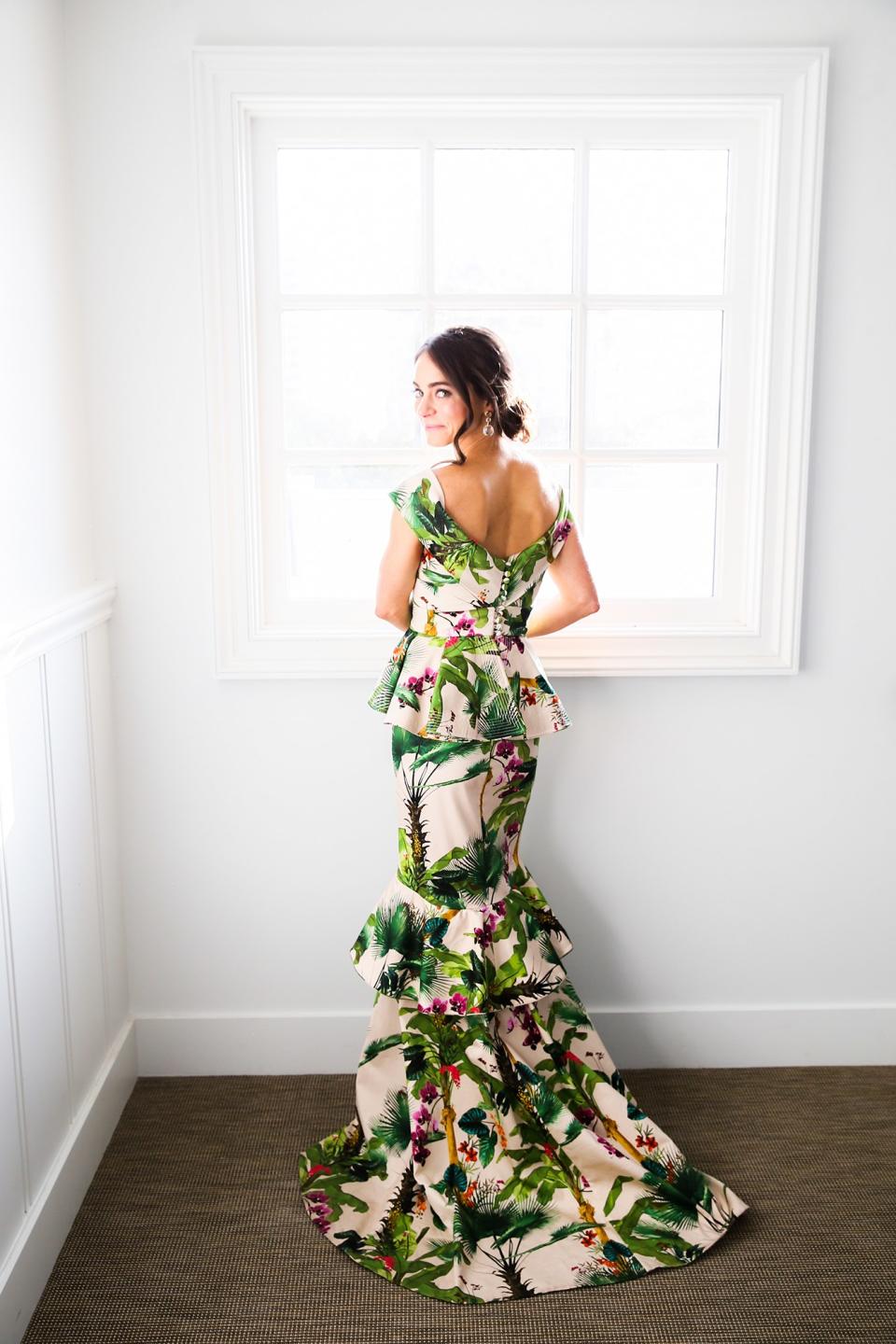 The bride wore Oscar de la Renta, inspired by her grandmother, for her greenery-filled ceremony at the Beverly Hills Hotel.