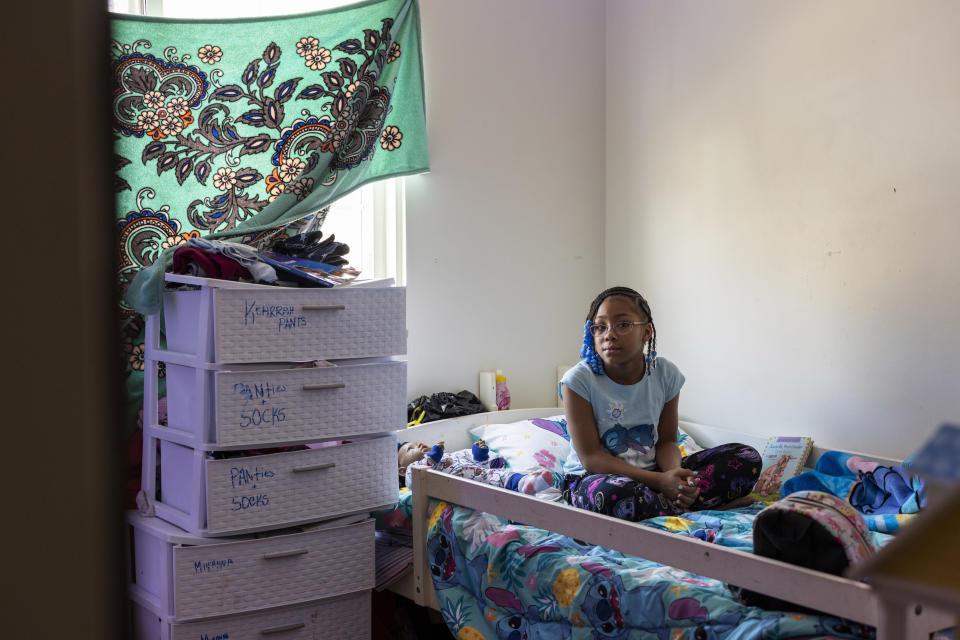Ke'Arrah Jessie, 9, sits for a portrait in her bedroom in Niagara Falls, N.Y., on Monday, April 3, 2023. Ke'Arrah was held back to repeat third grade after she had difficulty following along with online learning during the COVID-19 shutdown. (AP Photo/Lauren Petracca)