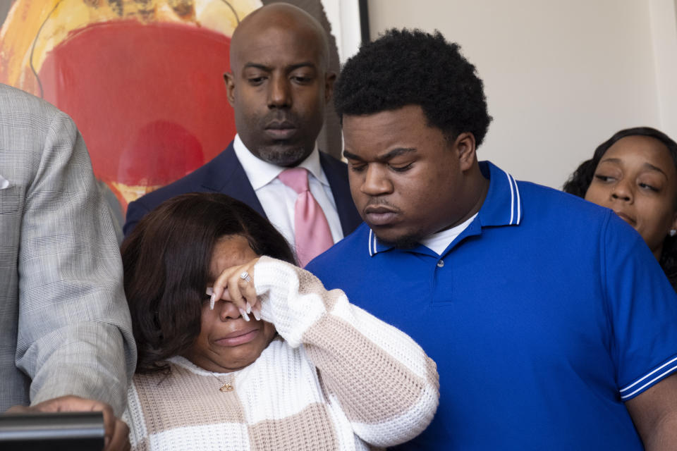 Jessica Ross and Treveon Isaiah Taylor Sr., parents of a baby who was decapitated during delivery, react during a press conference at their lawyers office in Atlanta, Wednesday, Feb. 7, 2024. (Ben Gray/Atlanta Journal-Constitution via AP)