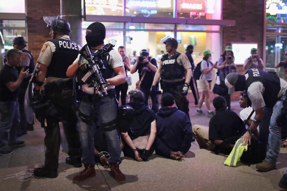 <p>Police arrest demonstrators protesting the acquittal of former St. Louis police officer Jason Stockley on Sept. 16, 2017 in St. Louis, Mo. (Photo: Scott Olson/Getty Images) </p>