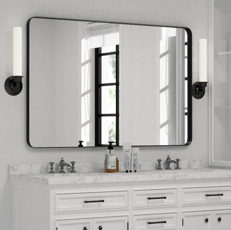 black metal square wall mirror in bathroom