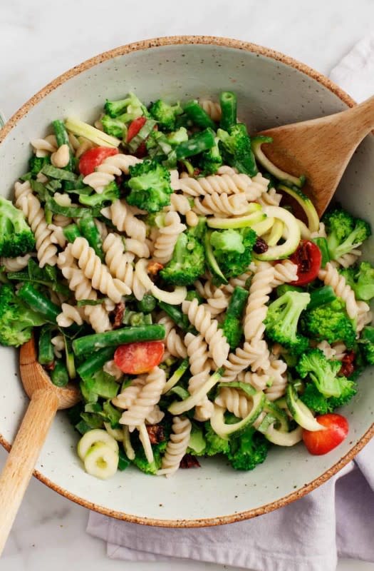 <p>Love and Lemons</p><p>This bright broccoli pasta salad recipe is chock full of fresh veggies and coated with a tangy no-mayo tahini dressing.</p><p><strong>Get the recipe: <a href="https://www.loveandlemons.com/broccoli-pasta-salad/" rel="nofollow noopener" target="_blank" data-ylk="slk:Broccoli Pasta Salad;elm:context_link;itc:0;sec:content-canvas" class="link rapid-noclick-resp"><em>Broccoli Pasta Salad</em></a></strong></p>