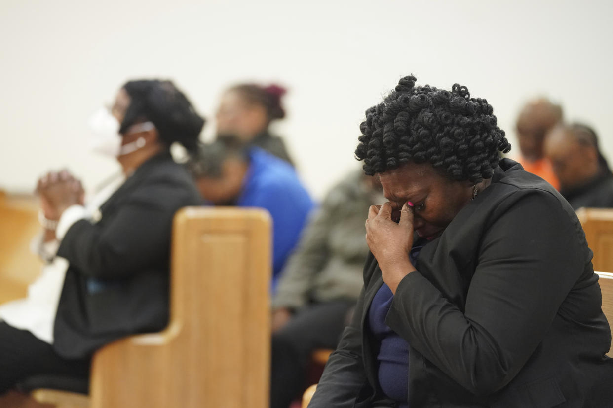 Elder Sharon Hammond prays during a vigil for a group of Americans recently kidnapped in Mexico, at Word of God Ministries in Scranton, S.C., Wednesday, March 8, 2023. Two of the four Americans, all from South Carolina, were killed after being caught in a deadly shootout while traveling last week to Matamoros for one of them to get cosmetic surgery. (AP Photo/Sean Rayford)