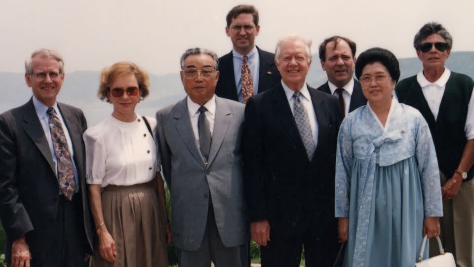 Former CNN International Editor Eason Jordan stands behind North Korean leader Kim Il Sung and US President Jimmy Carter in Pyongyang in 1994. - Eason Jordan