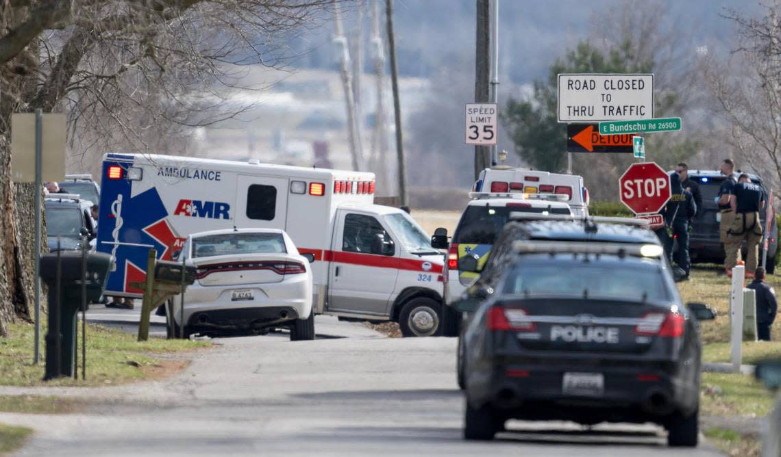 An ambulance leaves the scene of an officer involved shooting near the intersection of Elsea Smith Road and Bundschu Road on Thursday, Feb. 29, 2024, east of Independence.