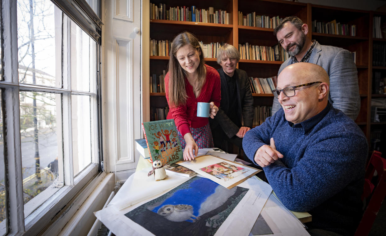 Paul Howard with Kelly McCaughrain (left), the previous children’s writing fellow, Glenn Patterson (centre), director of the Seamus Heaney Centre at Queen’s University Belfast, and Paul McVeigh, acting head of literature at the Arts Council of Northern Ireland (Brian Morrison/PA)