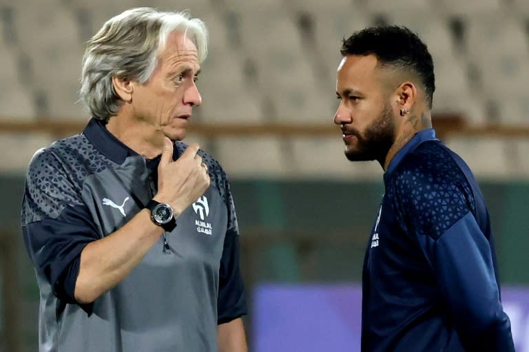 Neymar (right) with Al Hilal coach Jorge Jesus (ATTA KENARE)