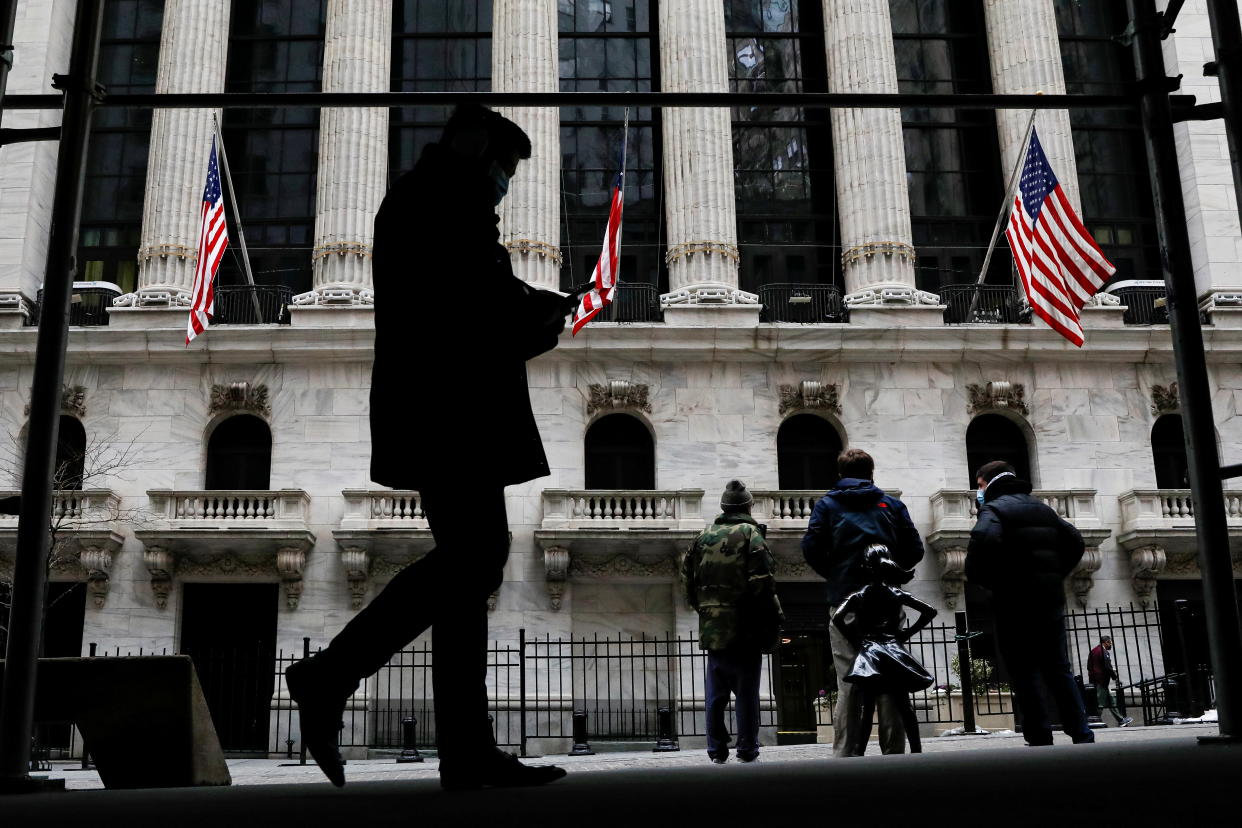 The Fearless Girl statue is seen outside the New York Stock Exchange (NYSE) in New York, U.S., February 12, 2021. REUTERS/Brendan McDermid