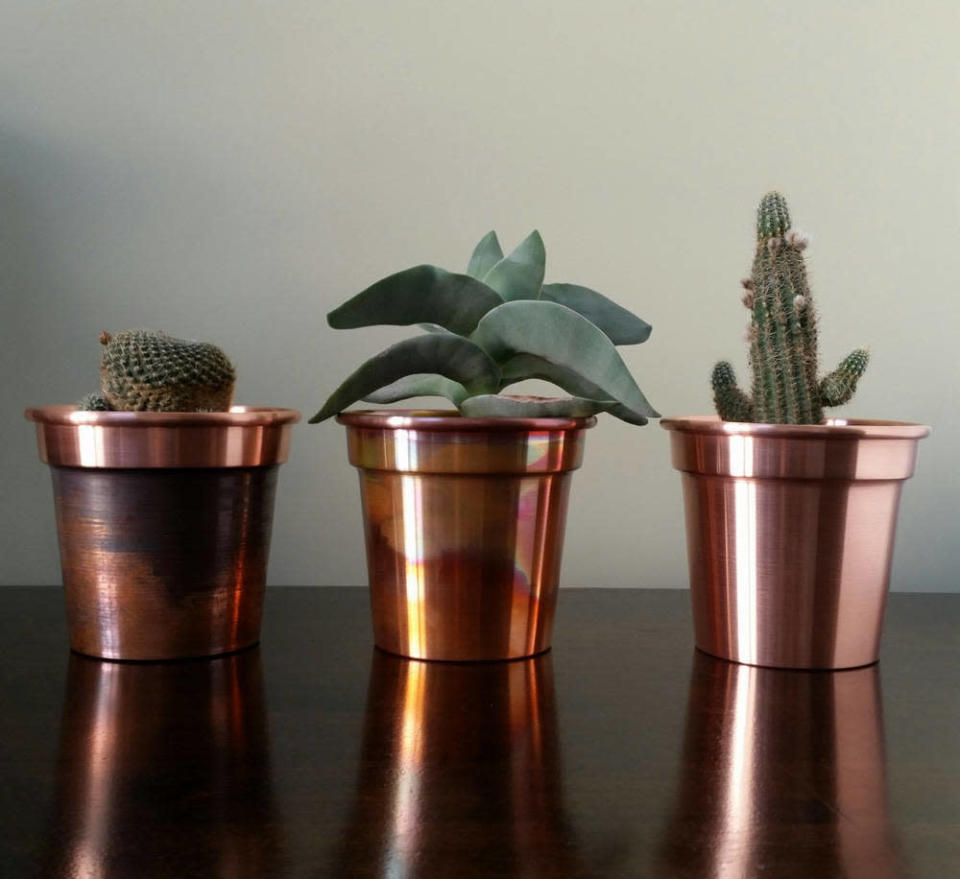 <p>Handmade copper plant pots (set of three), <a rel="nofollow noopener" href="https://www.etsy.com/uk/listing/508503990/4-inch-handmade-solid-copper-plant-pots?ga_order=most_relevant&ga_search_type=all&ga_view_type=gallery&ga_search_query=copper&ref=sr_gallery_37" target="_blank" data-ylk="slk:Spin360Shop on Etsy" class="link ">Spin360Shop on Etsy</a>, £65 </p>