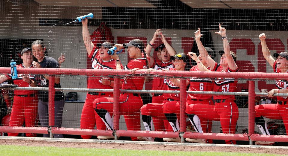 Utah players in the dugout celebrate as the University of Utah softball team plays Ole Miss in NCAA softball regional championship at Utah in Salt Lake City on Sunday, May 21, 2023. Utah won 4-1. | Scott G Winterton, Deseret News