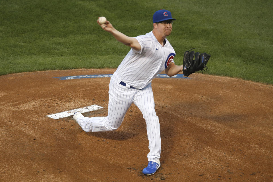 Chicago Cubs starting pitcher Alec Mills delivers during the first inning of a baseball game against the Milwaukee Brewers, Friday, Aug. 14, 2020, in Chicago. (AP Photo/Jeff Haynes)