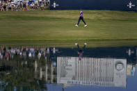Rory McIlroy, of Northern Ireland, walks up the 18th fairway during the third round of the U.S. Open Golf Championship, Saturday, June 19, 2021, at Torrey Pines Golf Course in San Diego. (AP Photo/Marcio Jose Sanchez)