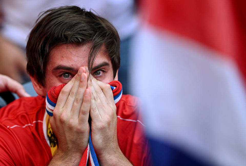 Soccer Football - FIFA World Cup Qatar 2022 - Group E - Japan v Costa Rica - Ahmad Bin Ali Stadium, Al Rayyan, Qatar - November 27, 2022 Costa Rica fan reacts after the match REUTERS/Dylan Martinez