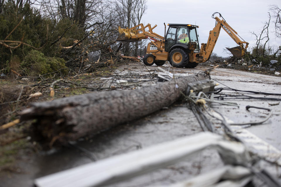 Crews work to clear roadways of debris caused by one of several tornadoes that tore through the state overnight on March 3, 2020 in Cookeville, Tennessee. At least 19 people were killed and scores more injured across the state in storms that caused severe damage in downtown Nashville. (Brett Carlsen/Getty Images)
