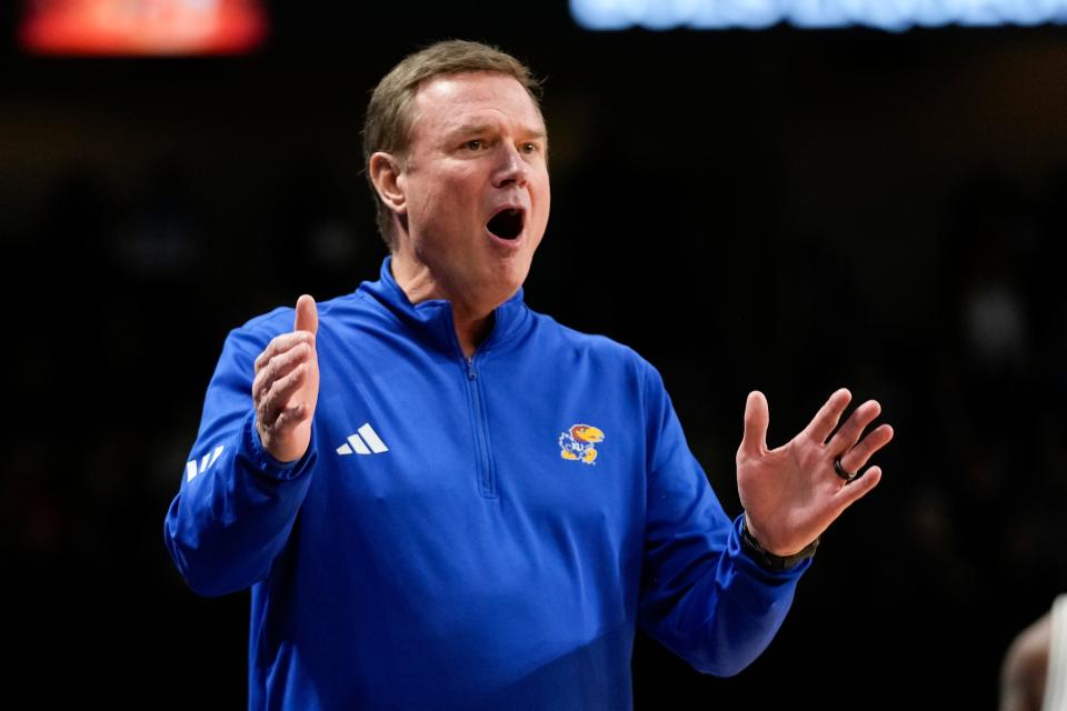 Kansas basketball coach Bill Self questions a ruling by an official during the first half of a game Wednesday in Orlando against UCF.