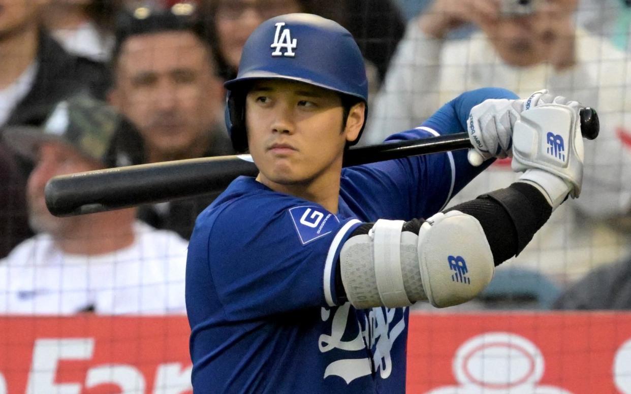 Shohei Ohtani playing for the LA Dodgers - Shohei Ohtani – baseball's highest-paid star – denies involvement in betting scandal