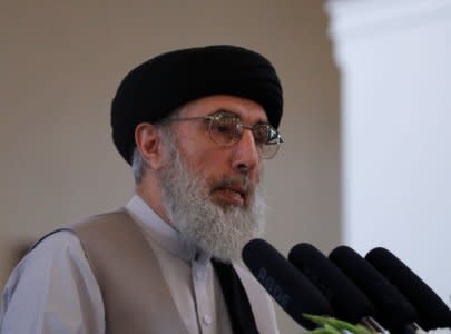 FILE PHOTO: Afghan warlord Gulbuddin Hekmatyar speaks during a welcoming ceremony at the presidential palace in Kabul, Afghanistan May 4, 2017. REUTERS/Omar Sobhani