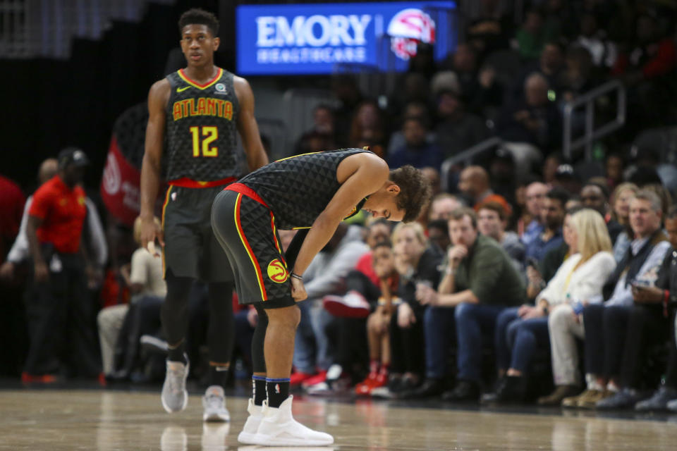 Trae Young（圖前）。(AP Photo/Brett Davis)